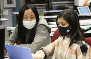 Freshman Girls Study in a classroom