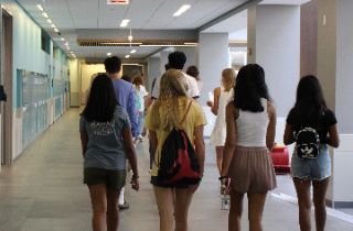 Transfer students walking through the school hall