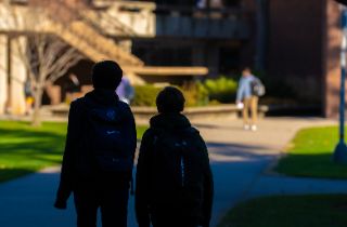 incoming 9th students walking through courtyard